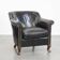 Fauteuil en cuir de vachette grainé noir