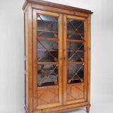 Blond wood cabinet with glass doors, 1970s.