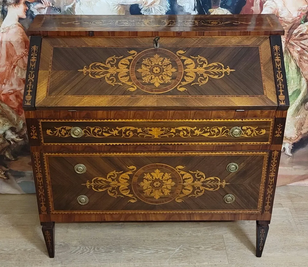 Louis XV style writing desk commode with drop-down front, made of precious wood.