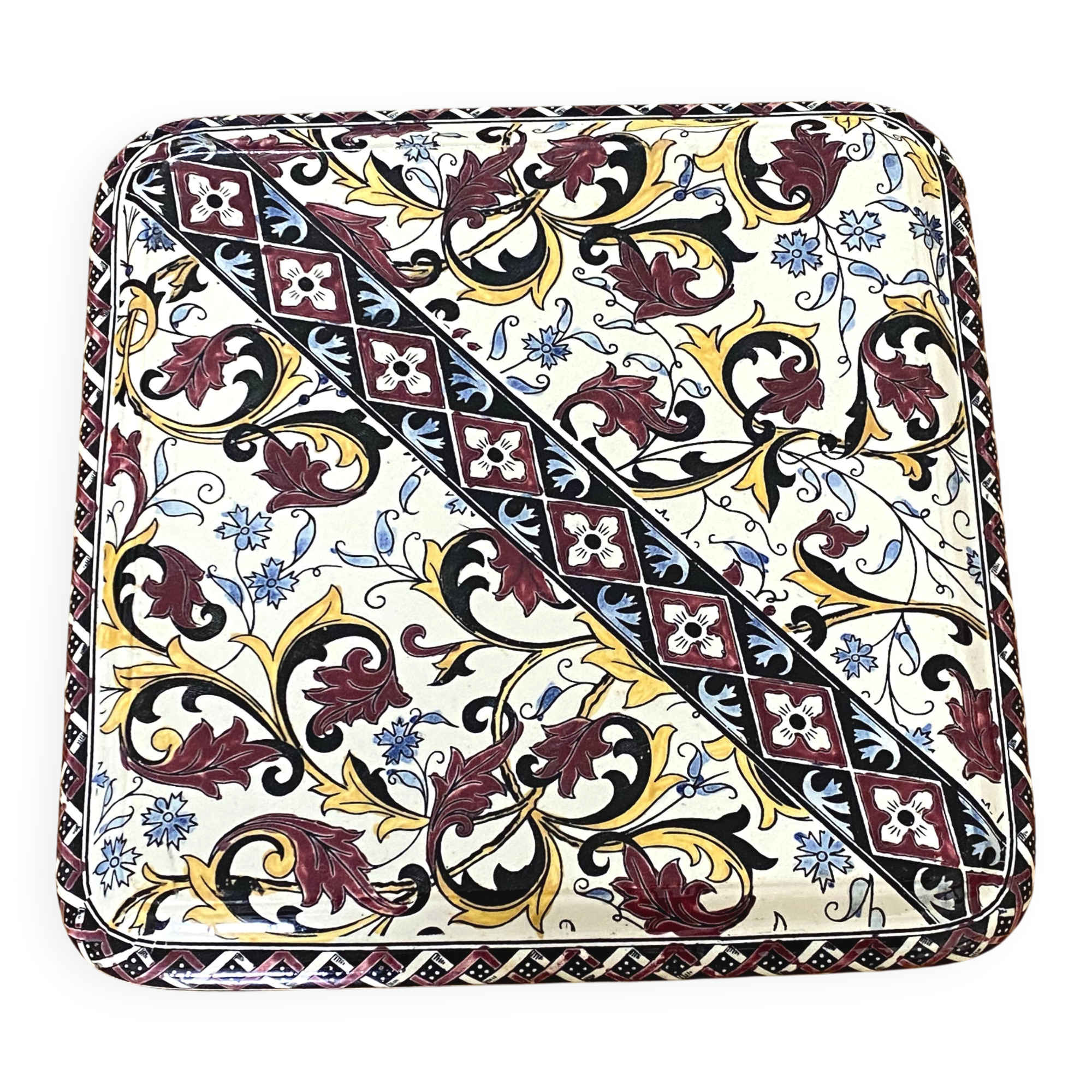 Vintage trivet in Gien earthenware with cornflower decoration.