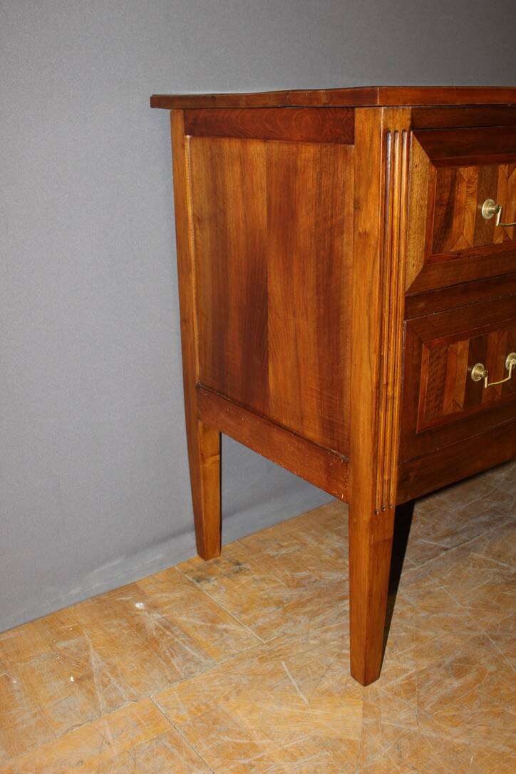 Louis XVI style chest of drawers in walnut and 19th century marquetry