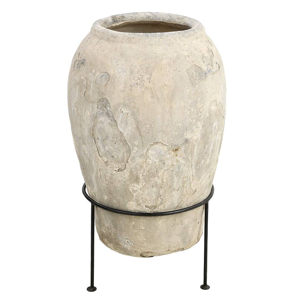 Large terracotta jar on foot
