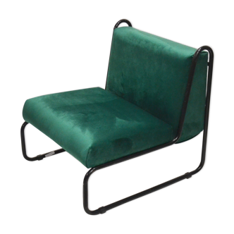 Green velvet armchair