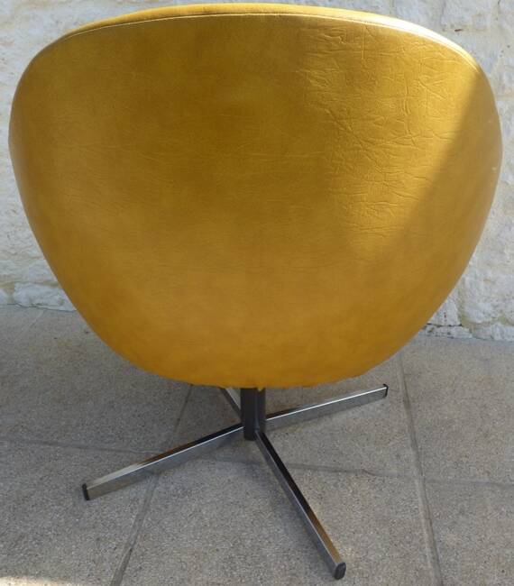 Vintage swivel armchair from the 70s in imitation leather