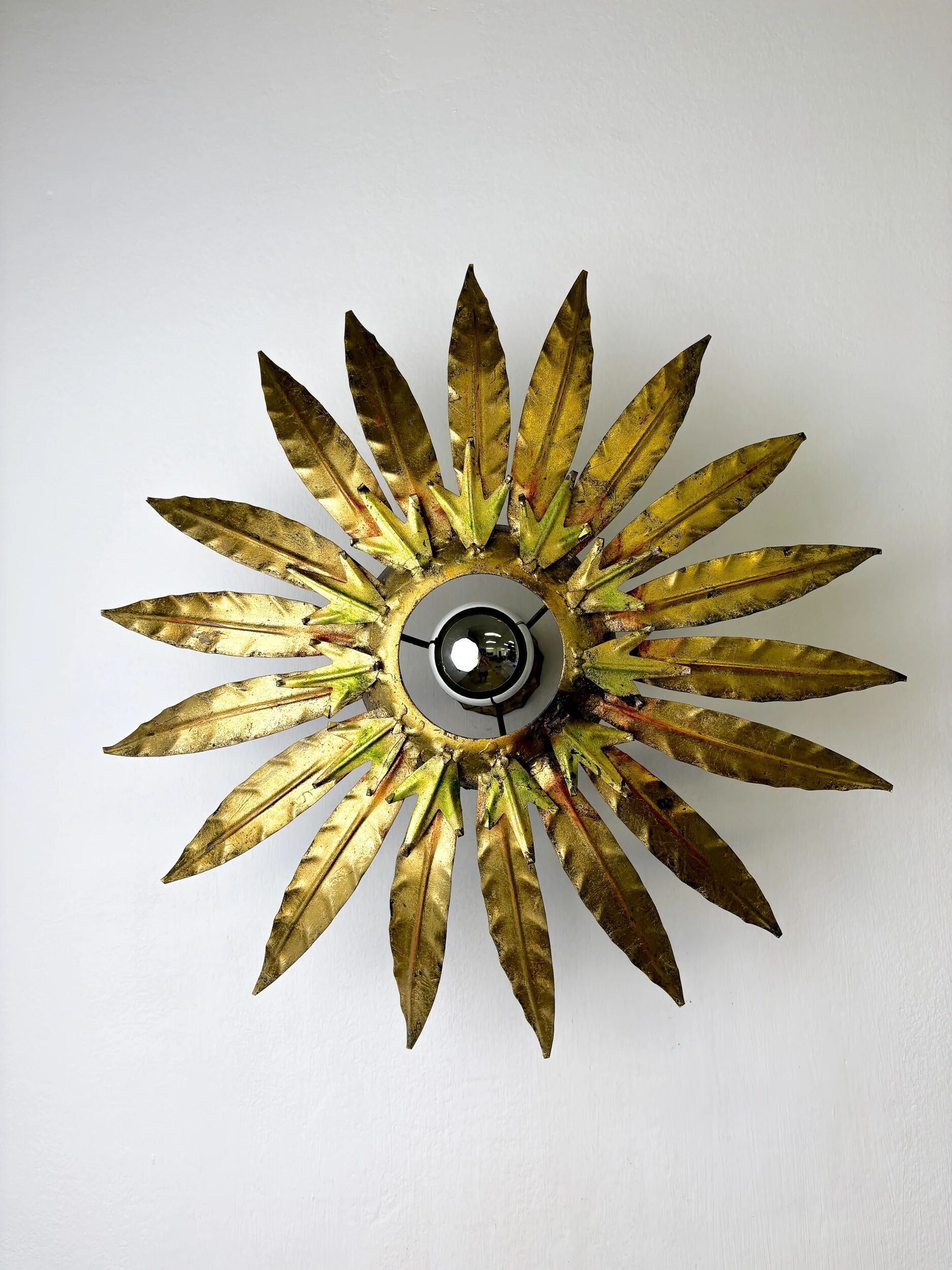 Mid-century modern sunburst light fixture with leaves, French craftsmanship, 1950s