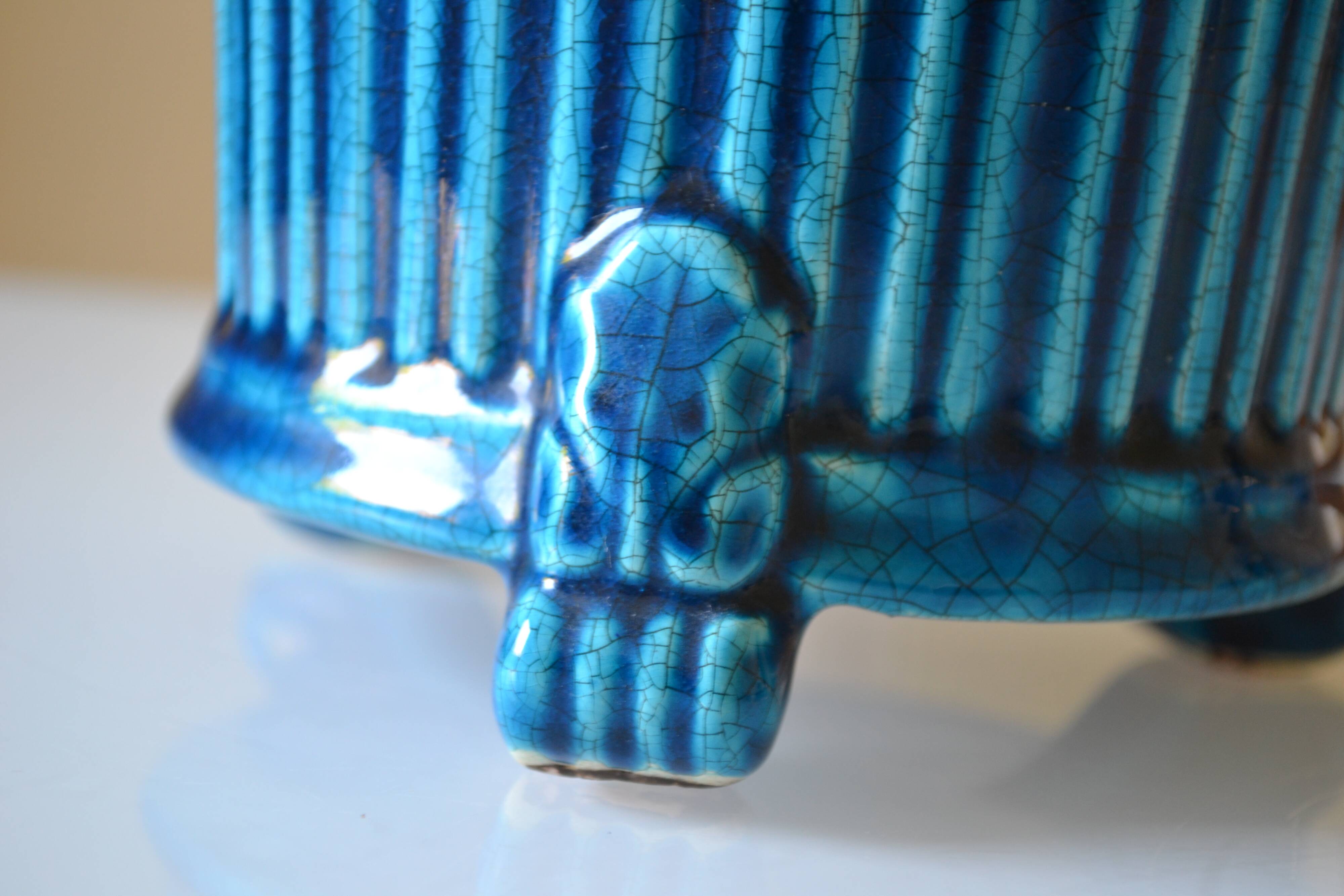 Cracked blue ceramic cache pot