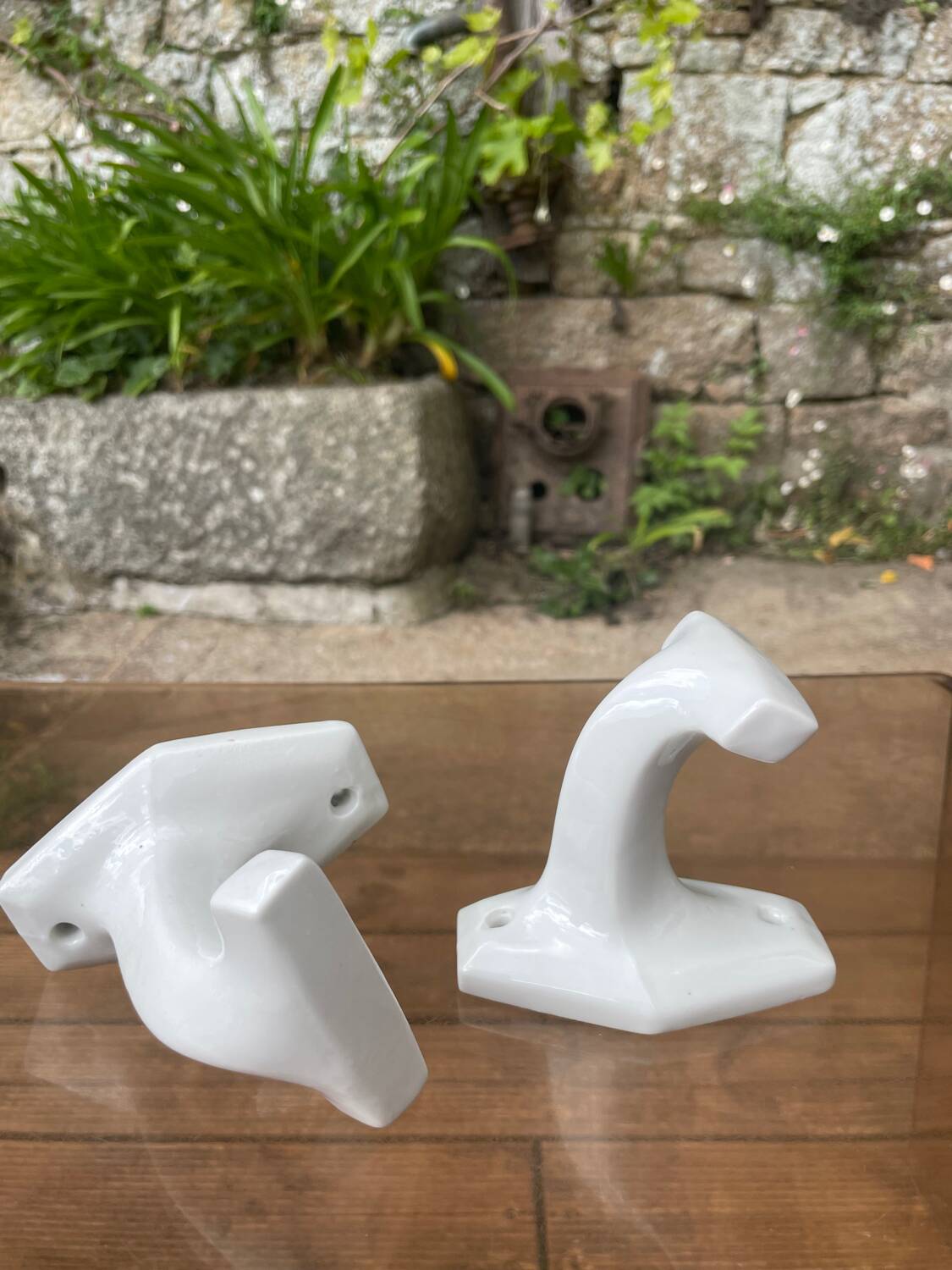 Duo of porcelain hooks