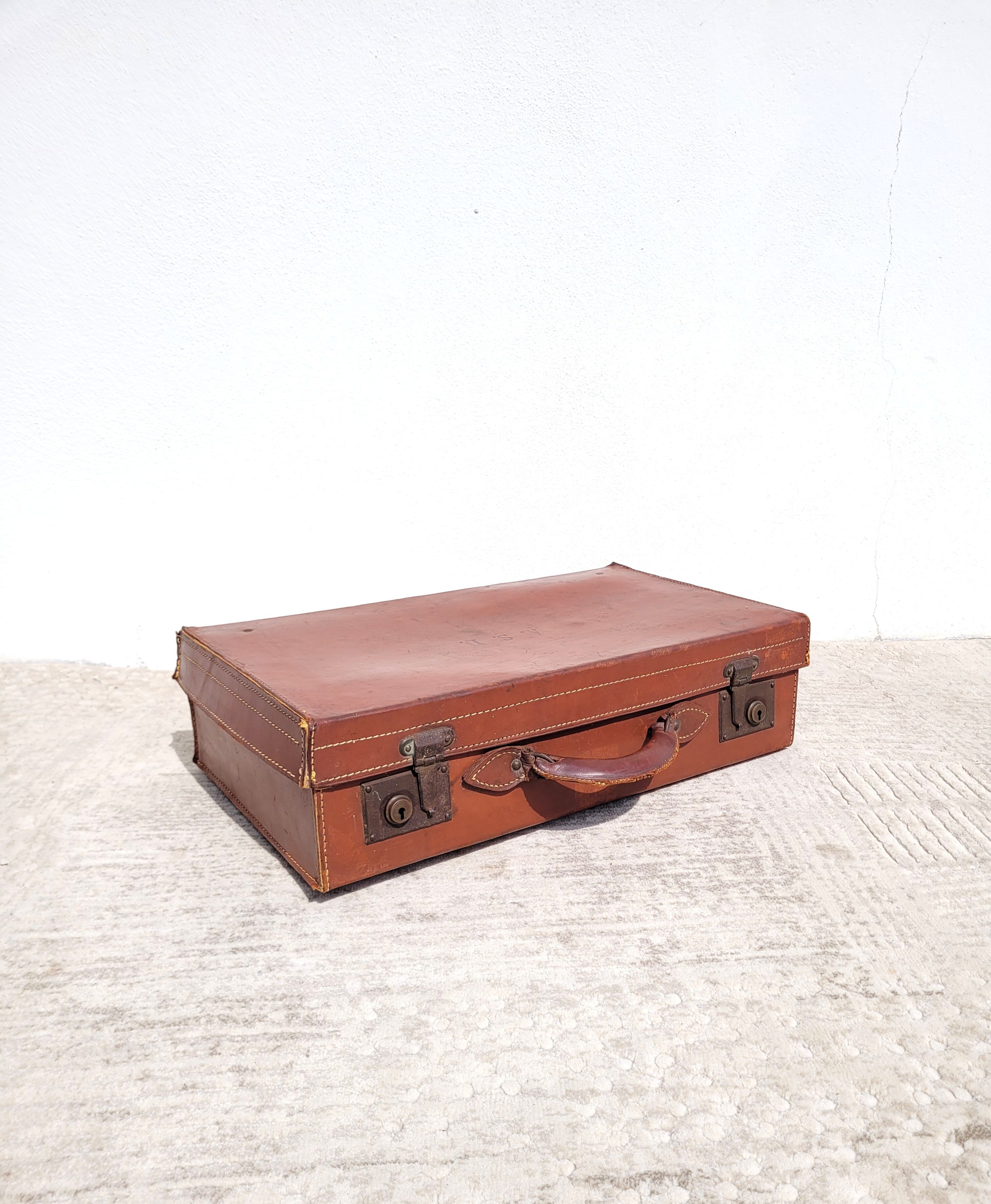 Old leather suitcase ASD