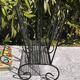 Vintage twisted wrought iron magazine or record holder - magazine rack