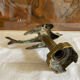 Bronze bird candle holder