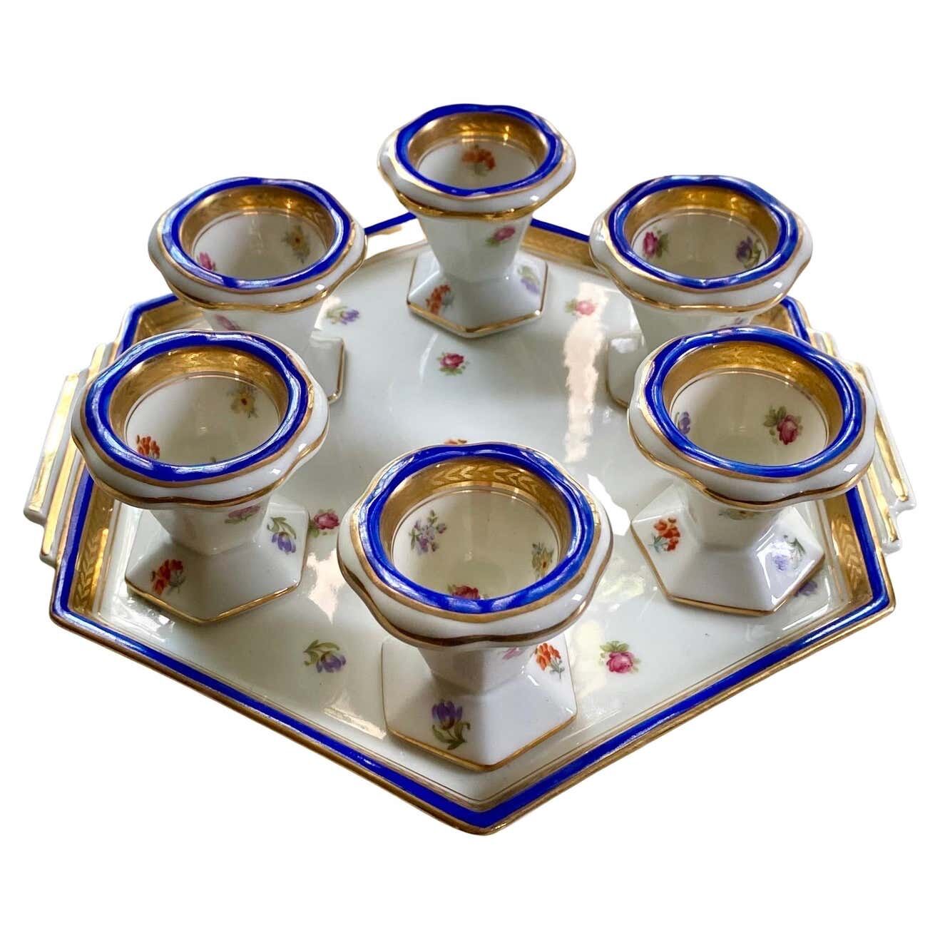 Blue and gold sweet egg set in Limoges porcelain, France, 1928