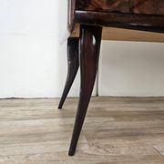 Mid-century mahogany buffet with teal glass and compartments with a drawer.