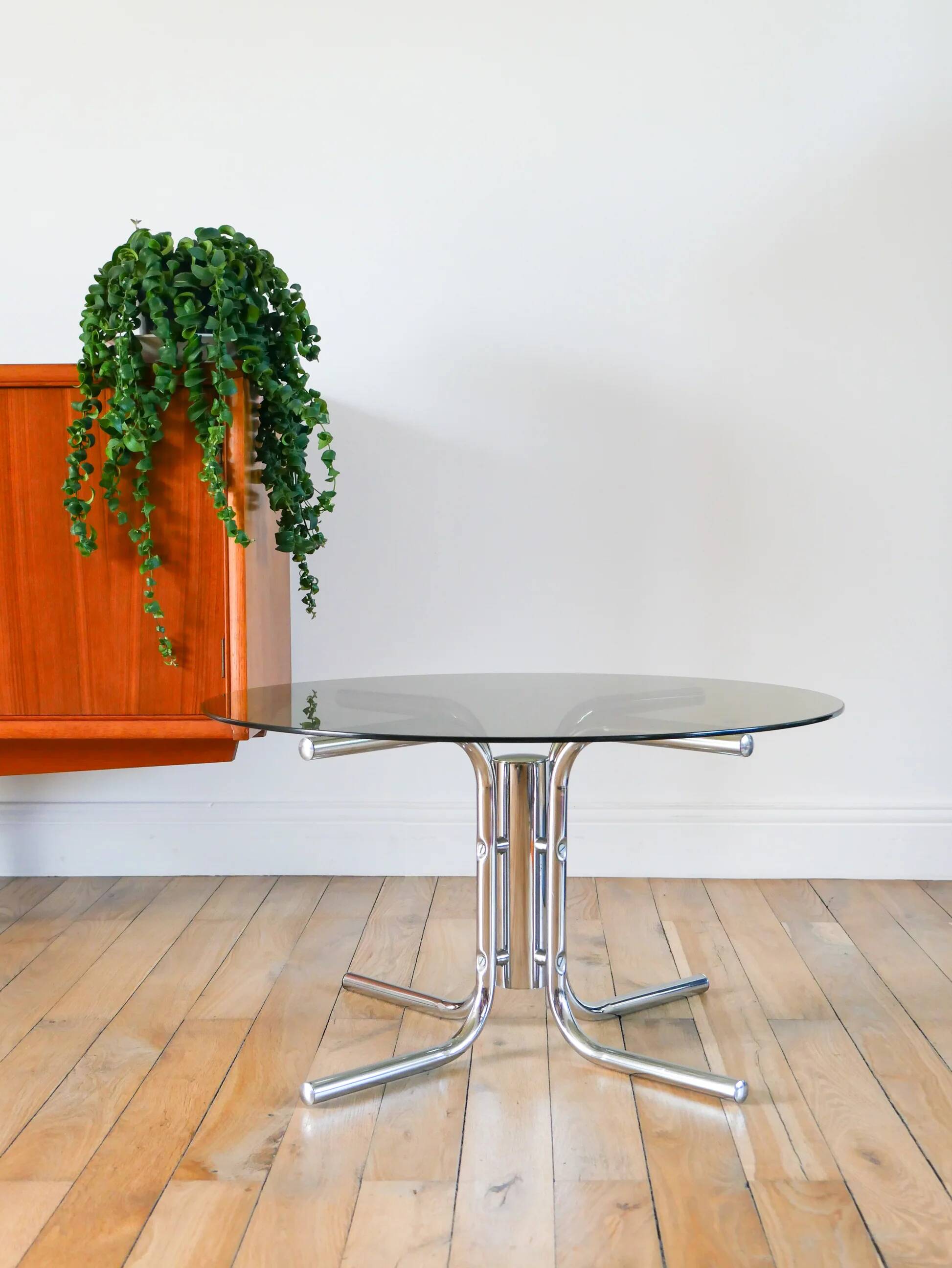 Round coffee table in smoked glass and chrome, star base, design, 1970.