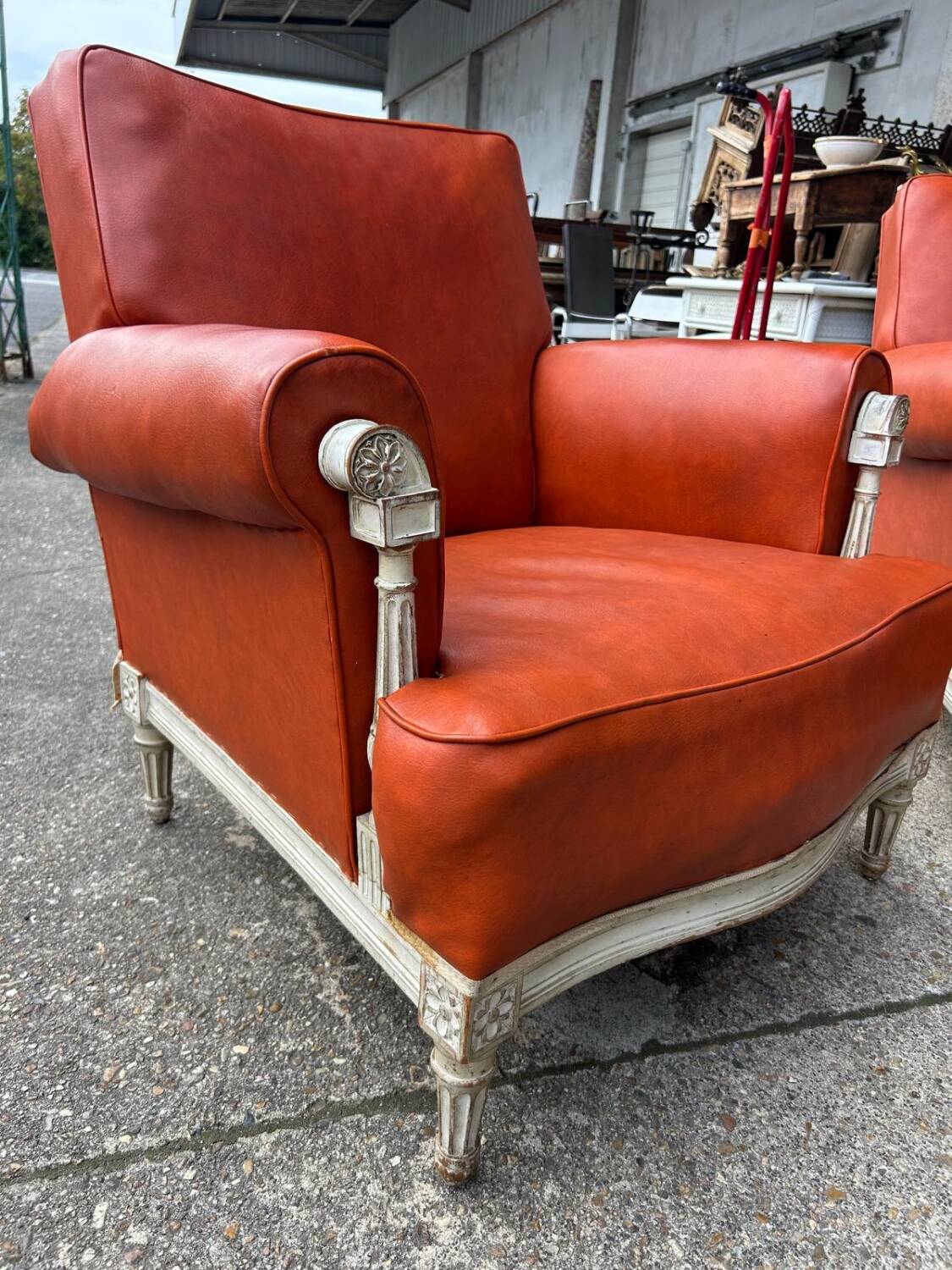 Pair of neoclassical bergère armchairs by Maison Jansen circa 1950.