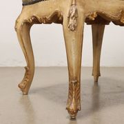 Pair of antique baroque-style poufs in gilded wood, 19th century.