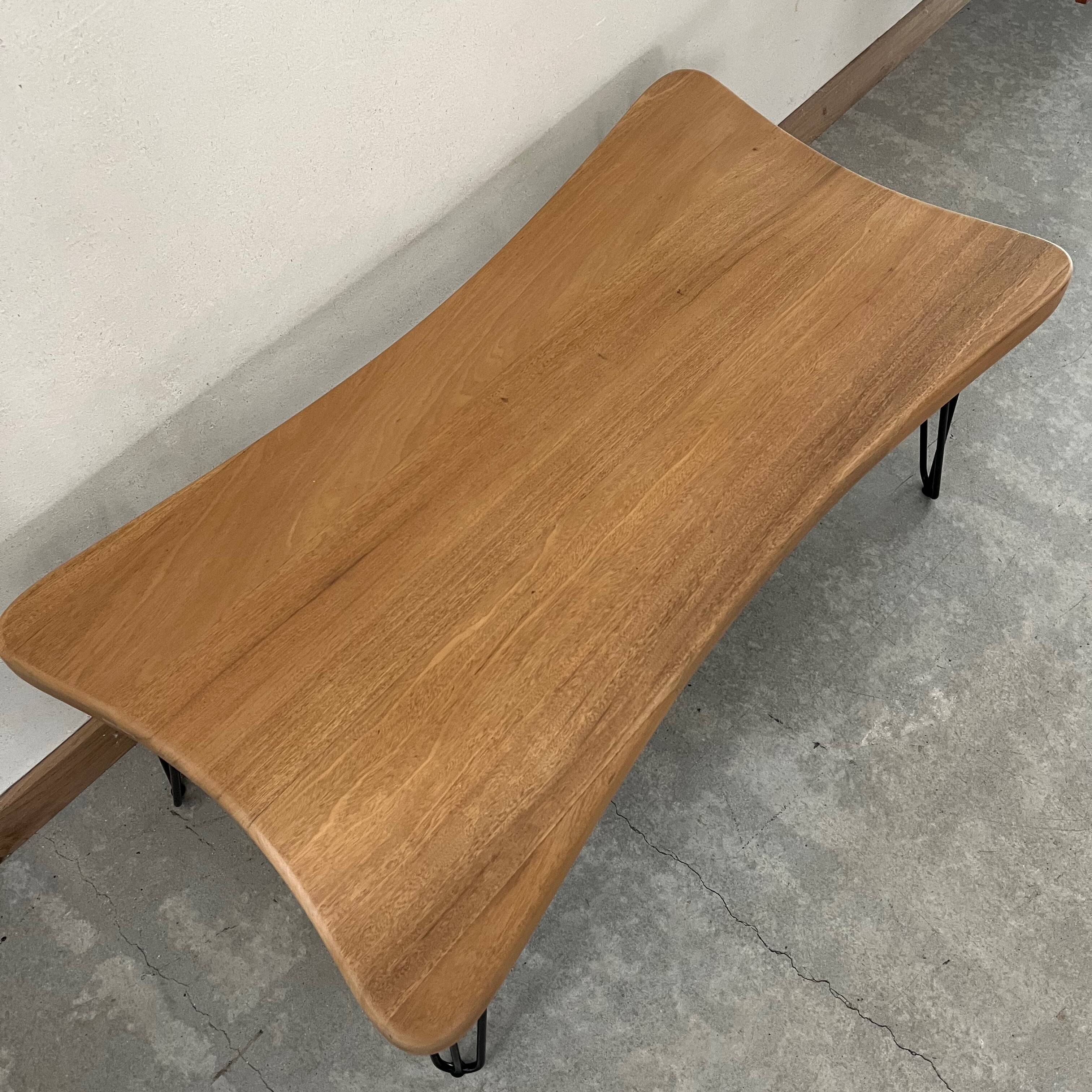 Wooden coffee table with metal legs
