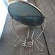 Vintage oval mirror on suspended stand