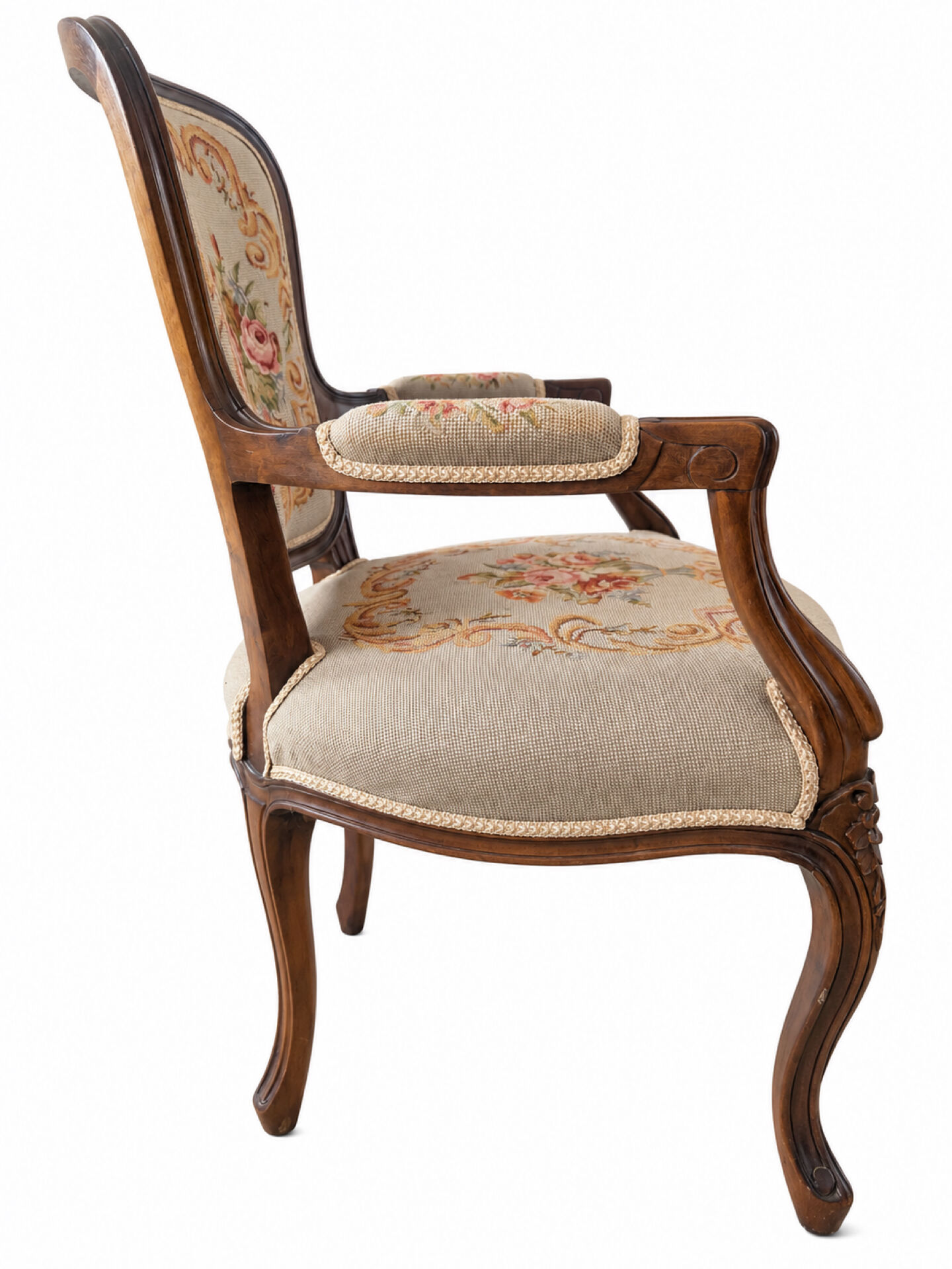 Louis XV style carved wooden armchair with floral needlepoint upholste