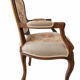 Louis XV style carved wooden armchair with floral needlepoint upholste