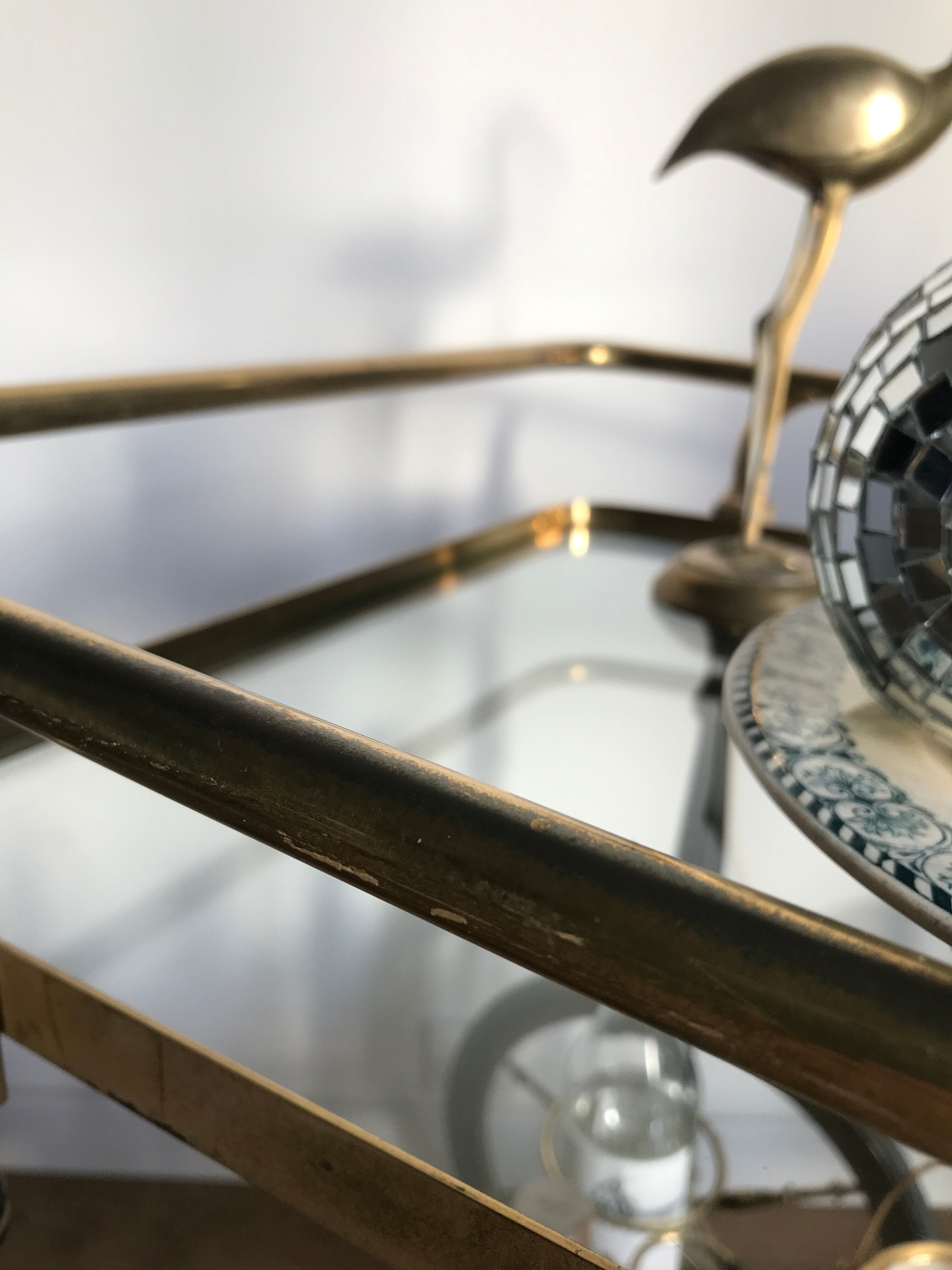 Vintage rolling golden and black dessert in brass and glass