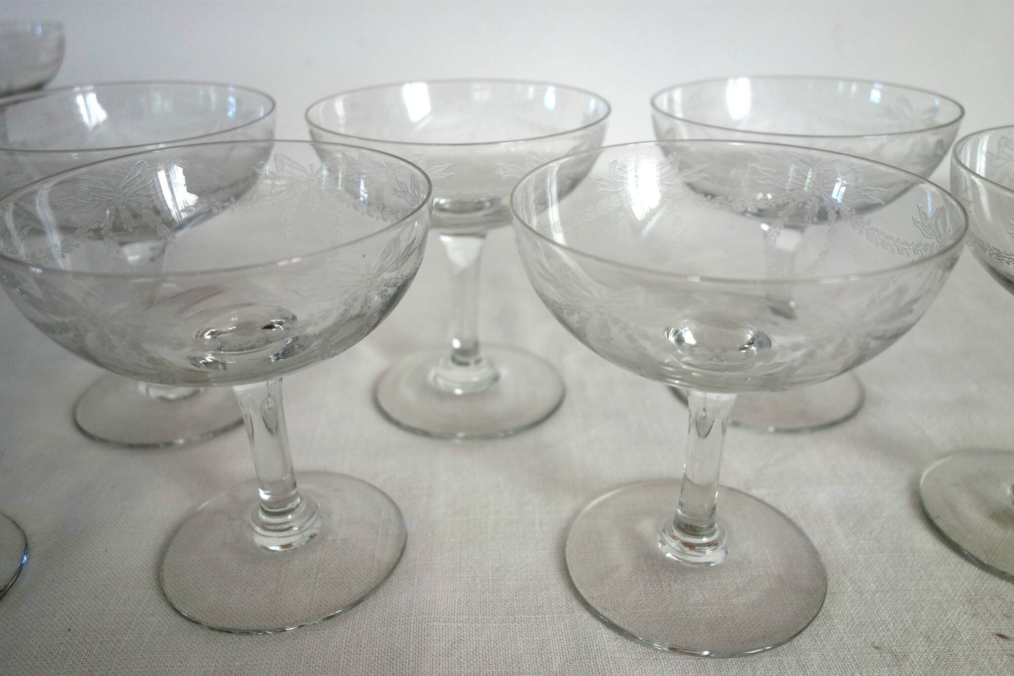 11 vintage engraved crystal champagne coupes