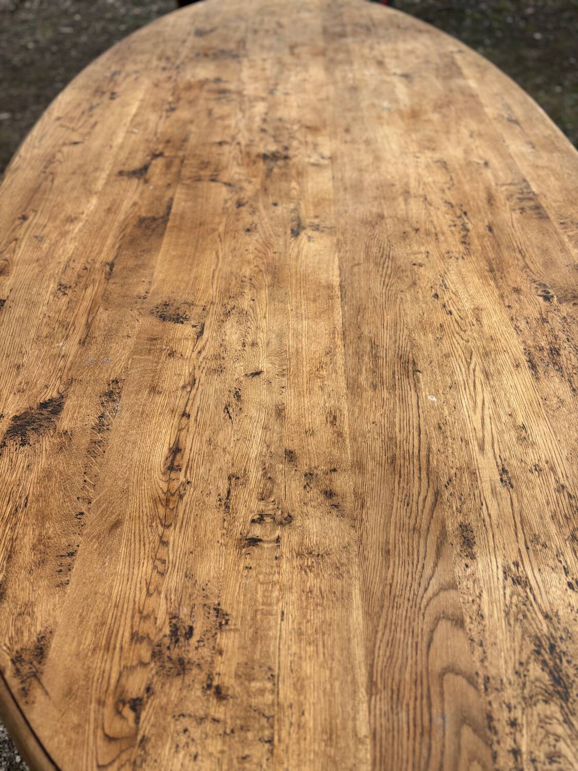 Oval solid wood dining table