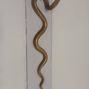 Bronze cobra candle holder wall sconce