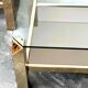 Set of 2 Belgo coffee tables in chrome brass and glass, Belgium, 1970s