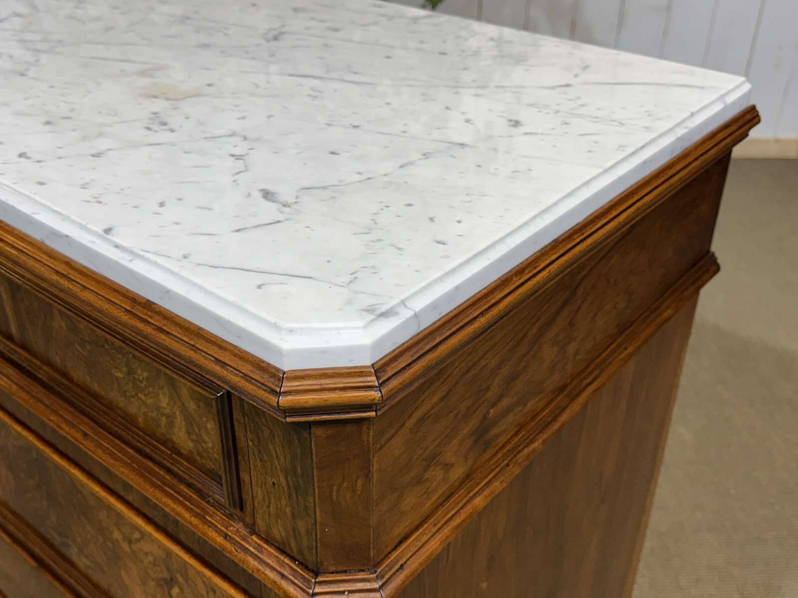 Napoleon III commode in walnut, fir and white marble from the 19th century.