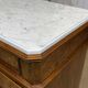 Napoleon III commode in walnut, fir and white marble from the 19th century.
