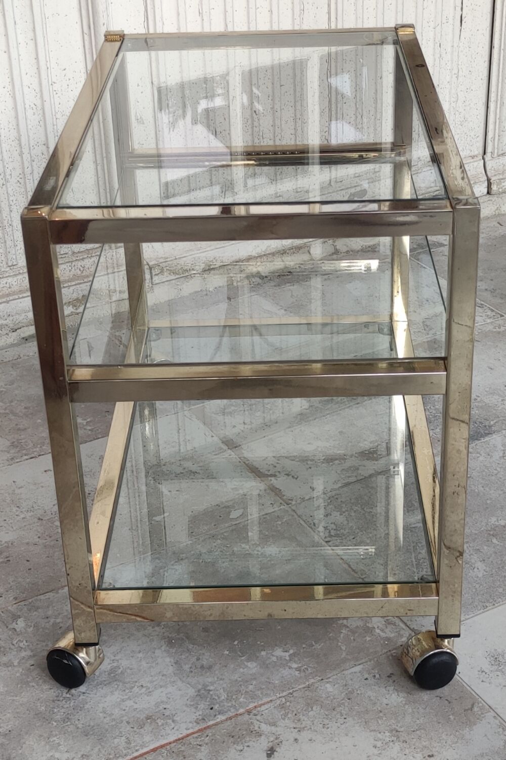 Rolling console service design / gold metal and glass