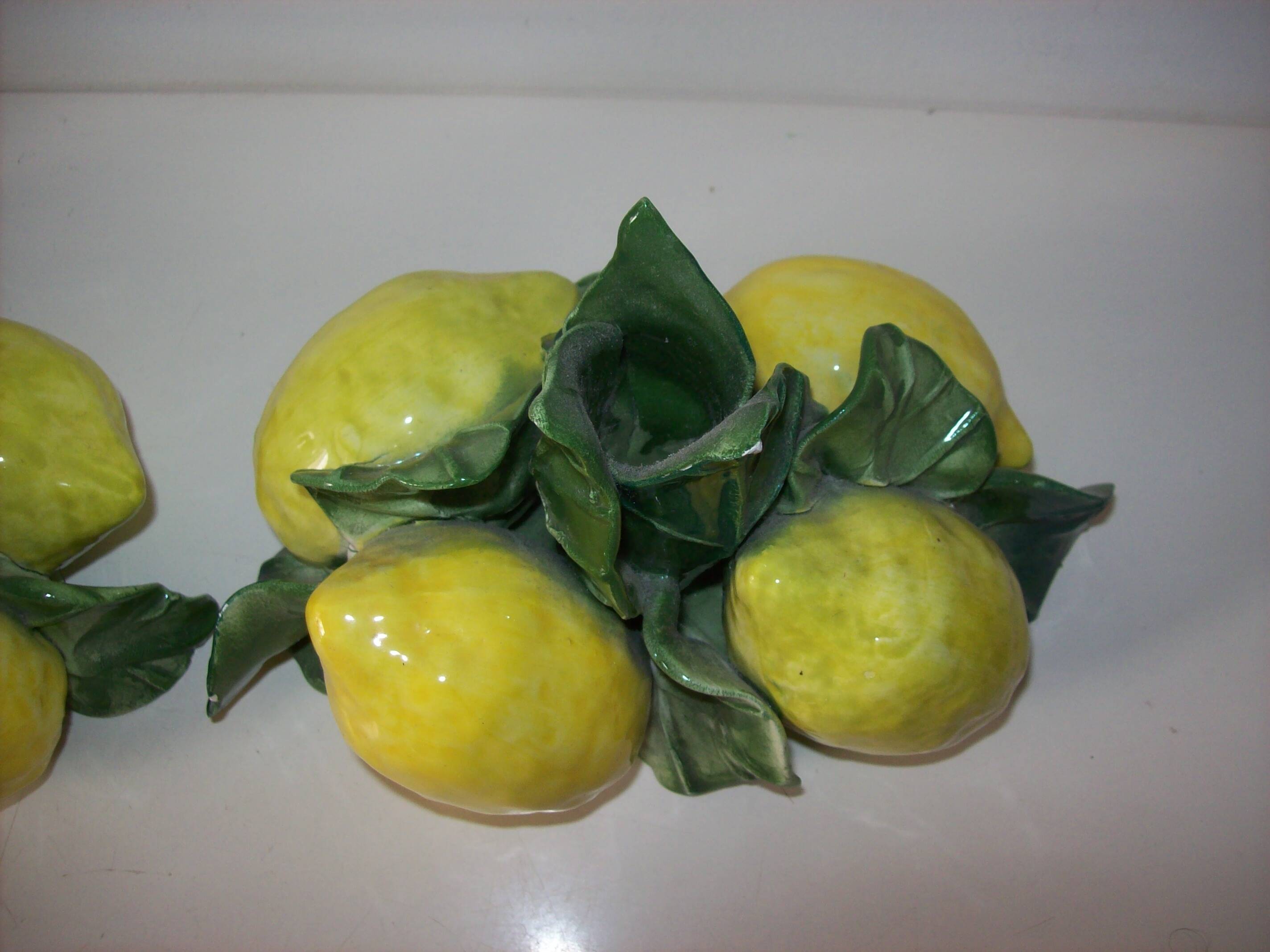 Pair of lemon slip candle holders