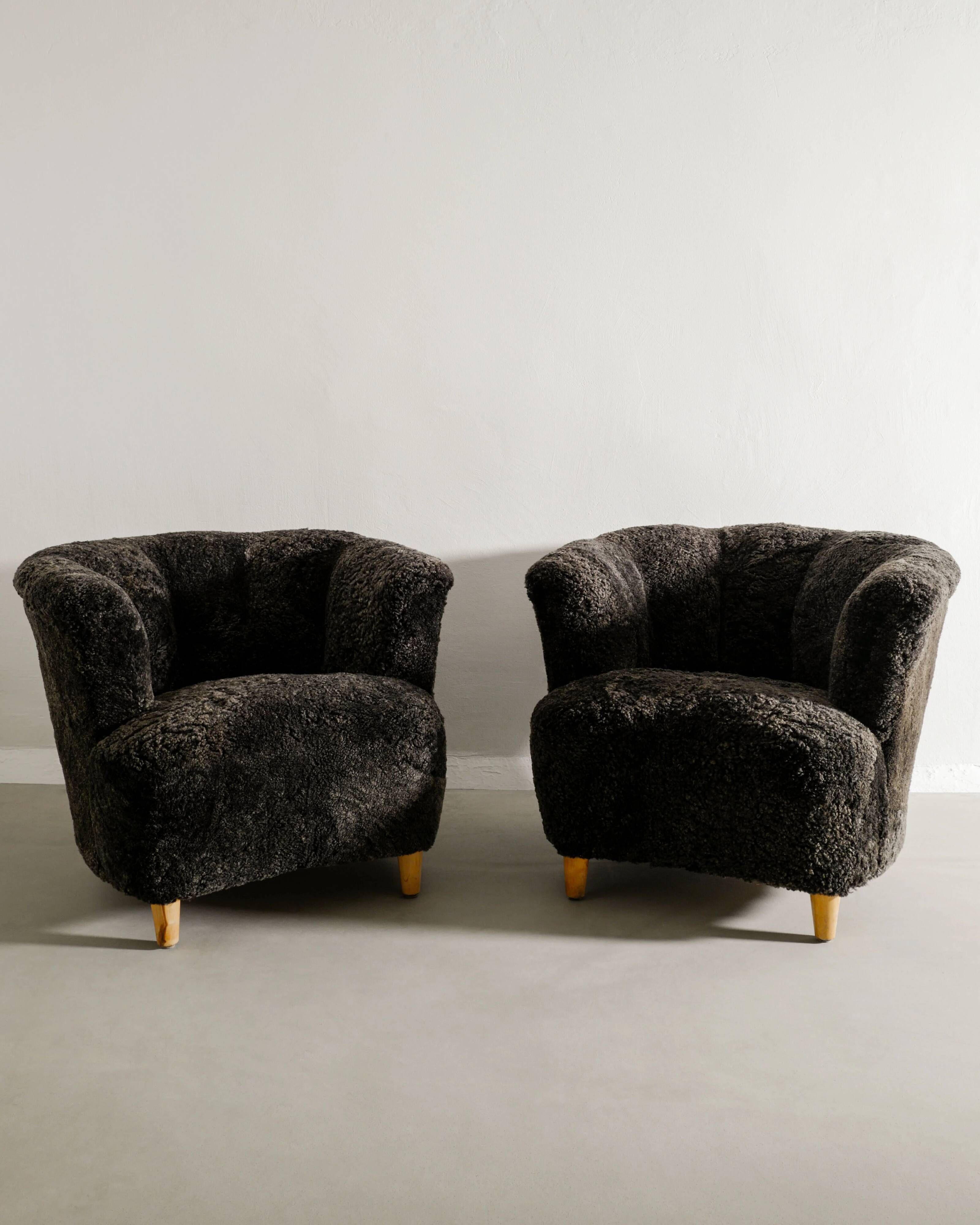 Pair of Swedish Curved Mid Century Modern Armchairs in Dark Sheepskin 1940s