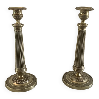 Pair of antique candle holders in brass and bronze