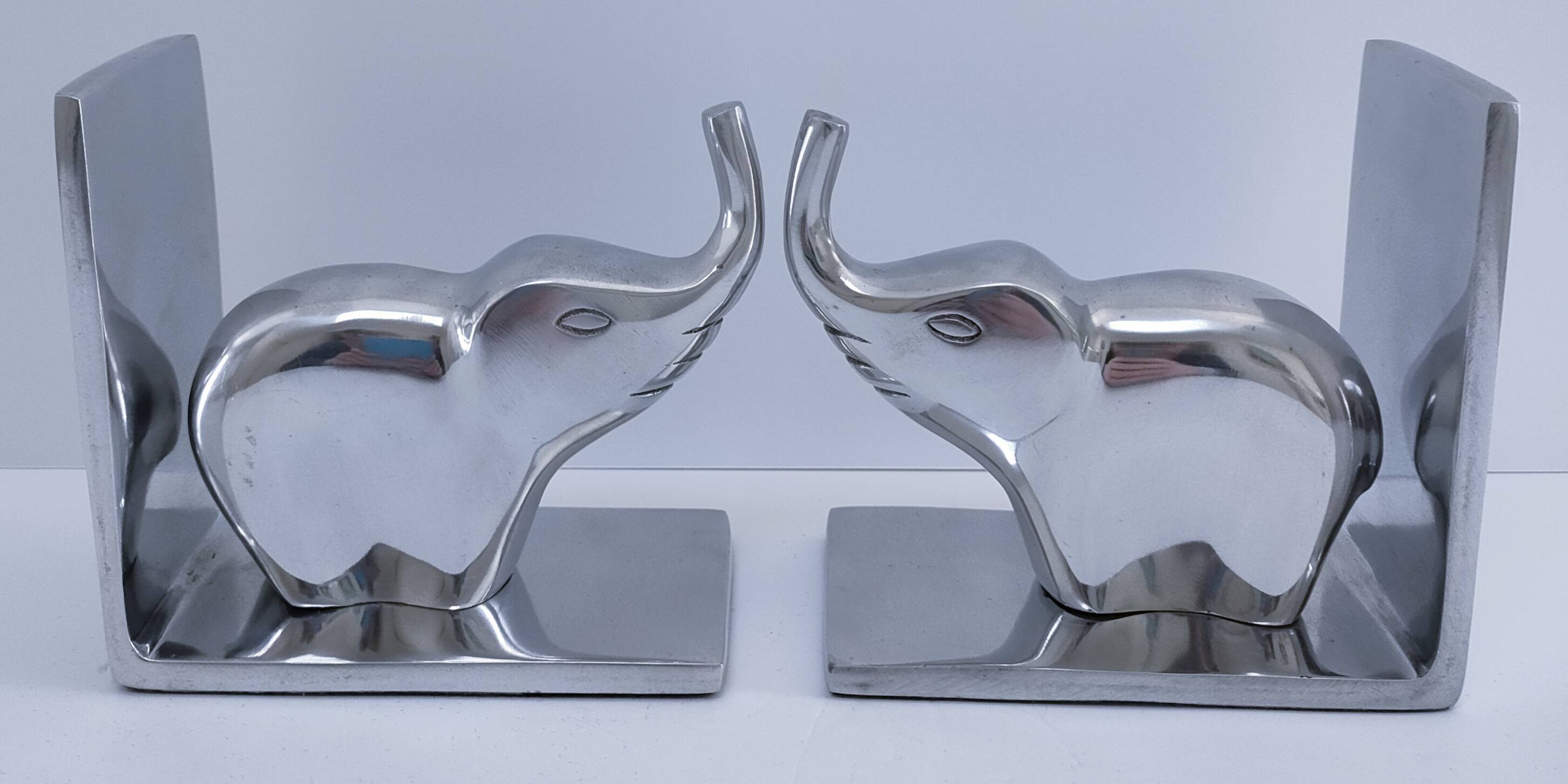 pair of stylised elephant bookends made of aluminium