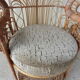 Fauteuil Emmanuelle en osier avec son coussin