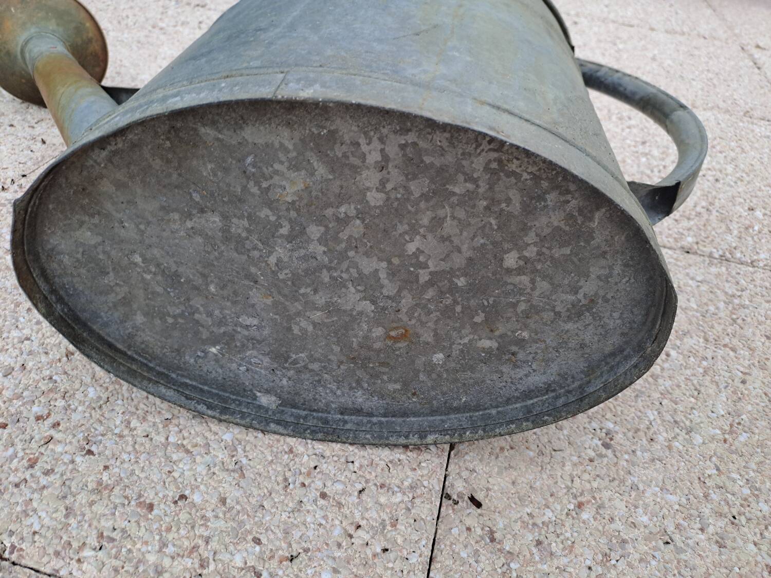 Old zinc watering can