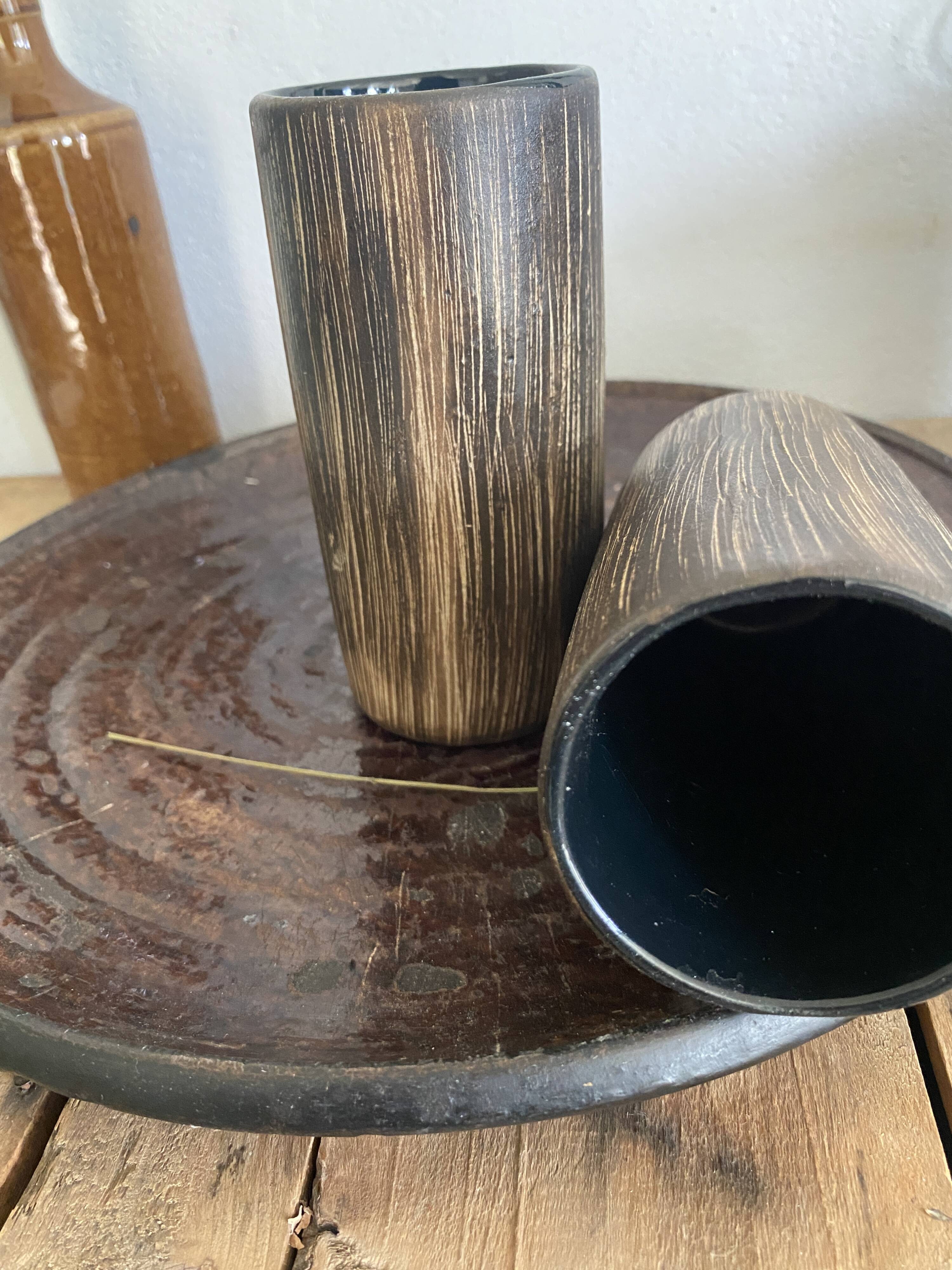 Six terracotta glasses, matt and glazed