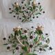 Pair of Italian Florentine wall sconces in tin and glass.