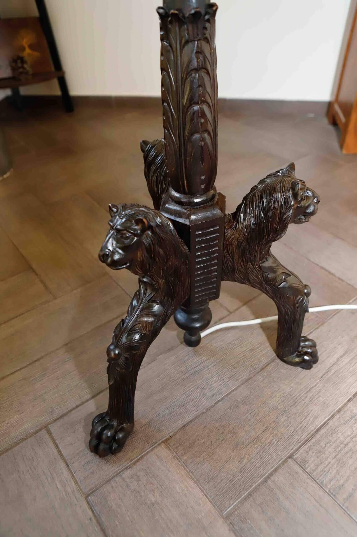 Antique floor lamp with lion motif