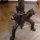 Antique floor lamp with lion motif