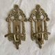 Brass coat hooks in the Napoleon III style.