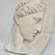 Visage antique en relief