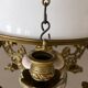 Antique lustre from the late 19th century, brass and opaline with floral decoration, 9 oil lights.