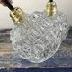 Pair of chiseled glass wall sconces