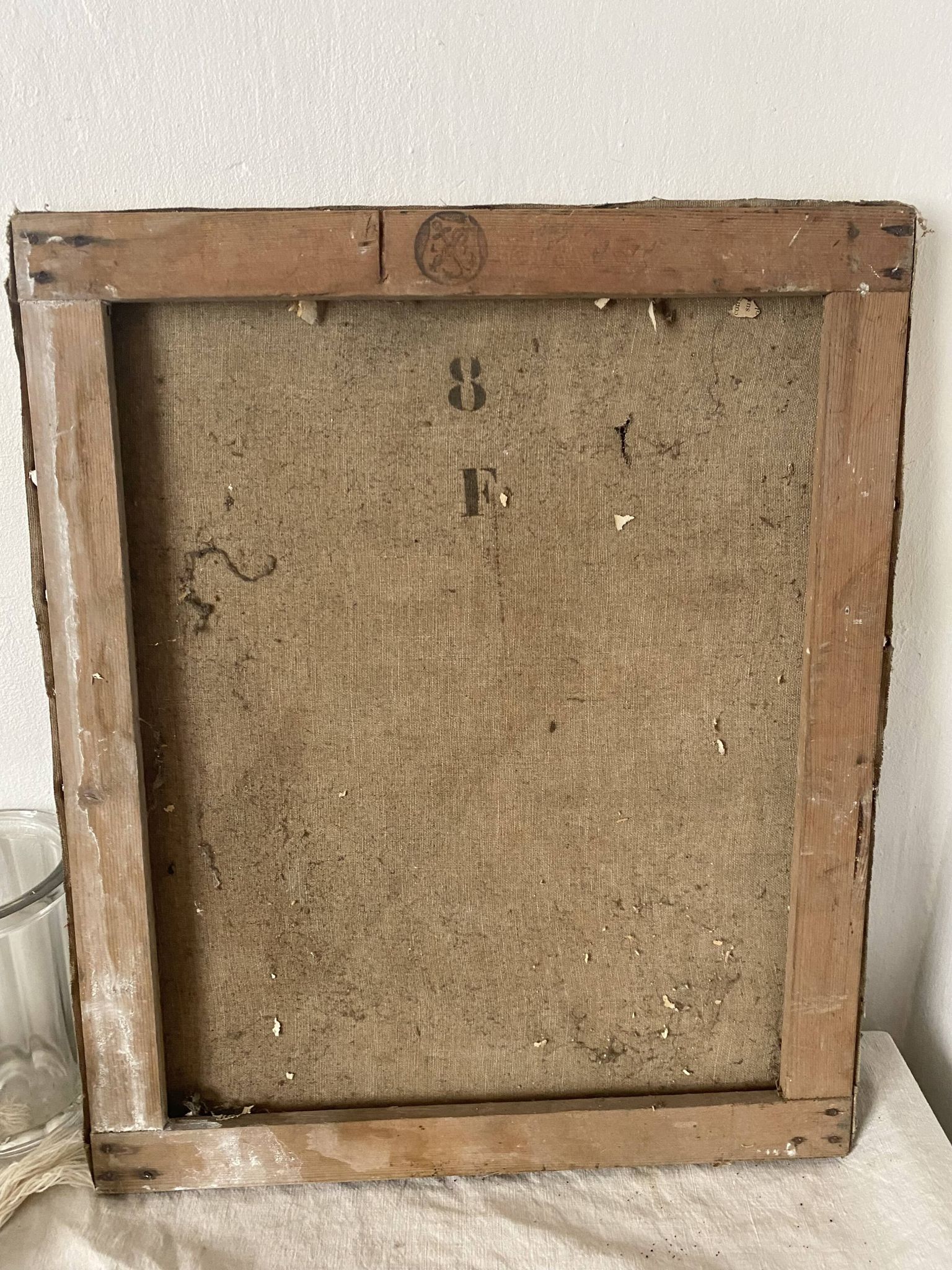 Old painting of a bouquet of poppies, canvas on a flower frame