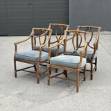 Set of 4 vintage McGuire rattan chairs with cushions.
