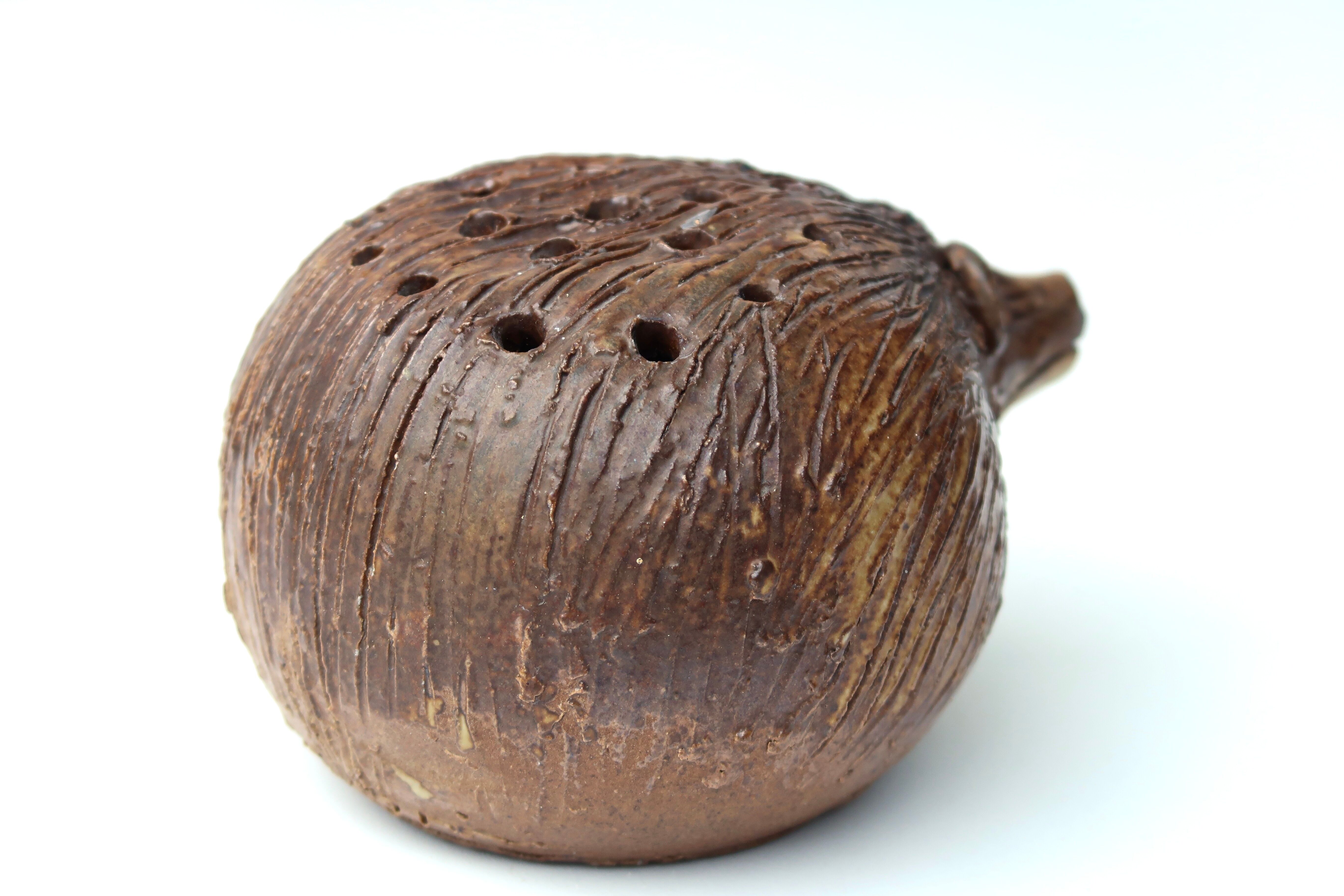 Ceramic hedgehog flower pick by Jacky Coville