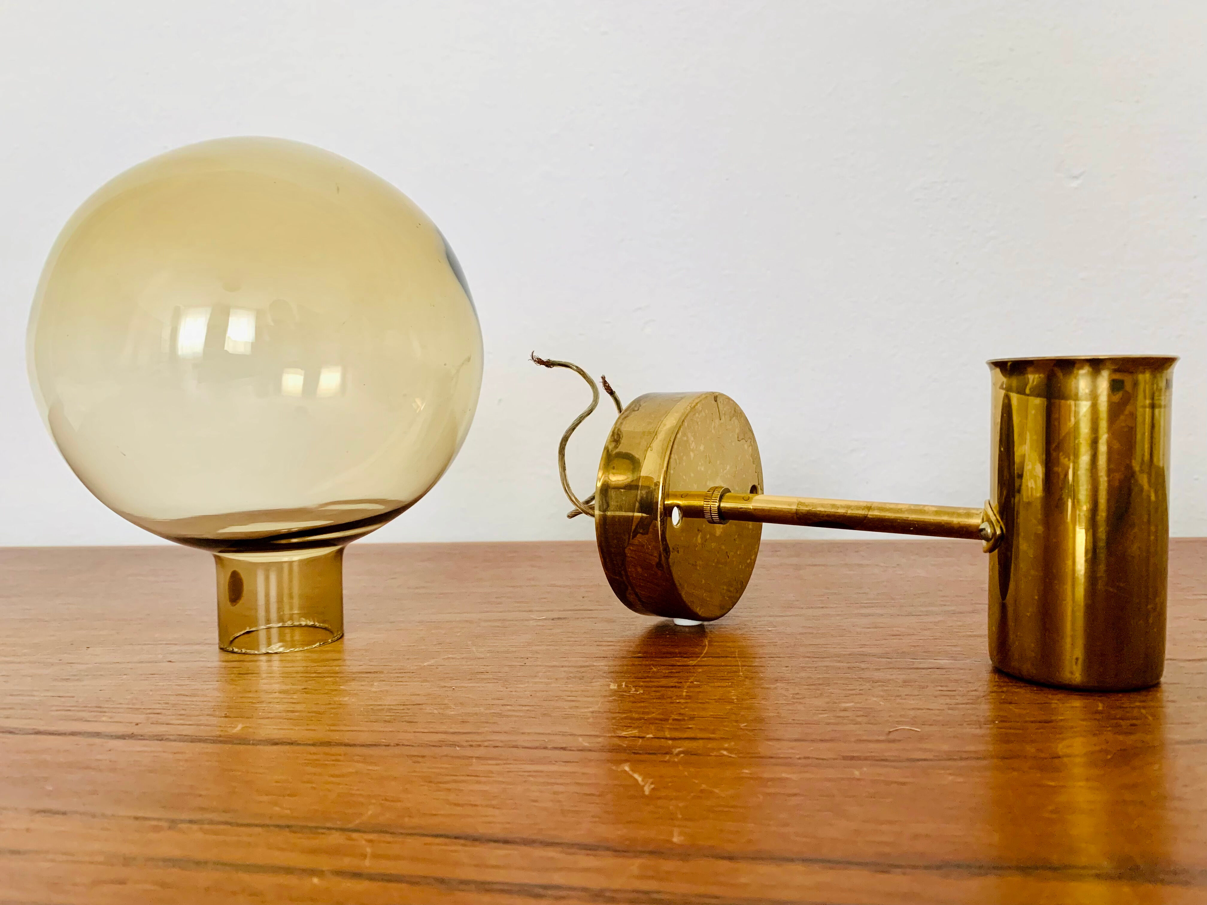 Brass wall lamp by Hans Agne Jakobsson