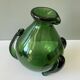 Amazing pitcher; vintage tripod jug or carafe in blown and hot-worked green glass